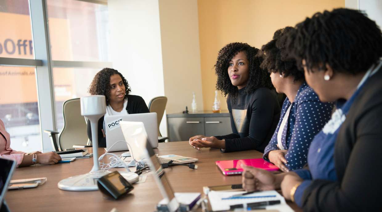 NIBCA team in a boardroom meeting